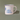 Produktfoto der Tasse. Auf der Tasse ist ein Schriftzug gedruckt: "A sip of happiness"